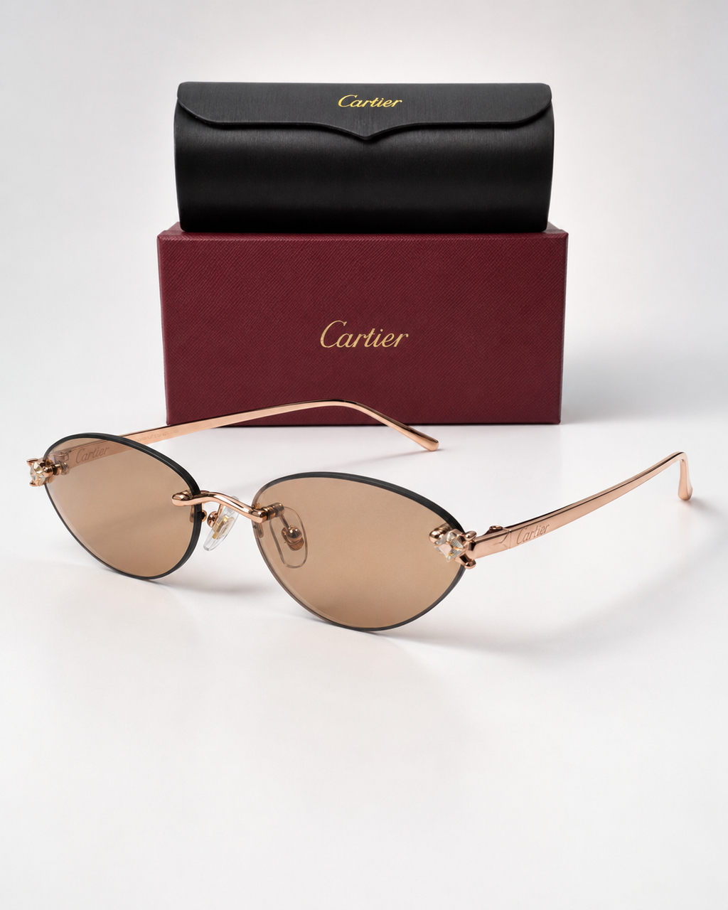 CR Crystal Accent Oval Rimless Sunglasses