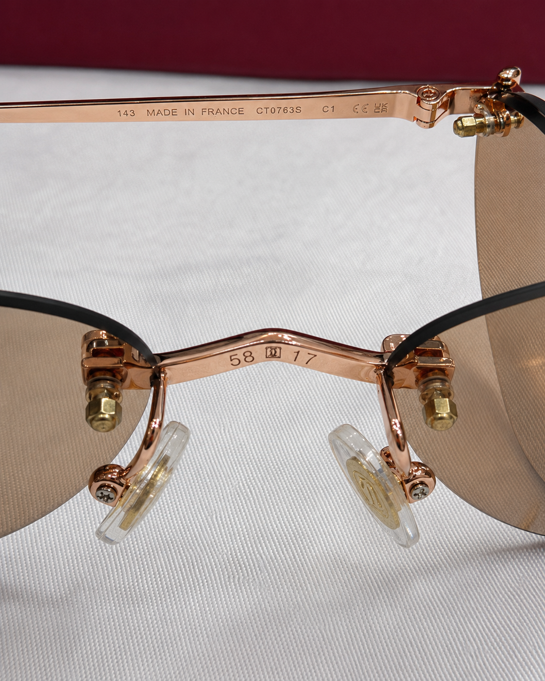 CR Crystal Accent Oval Rimless Sunglasses