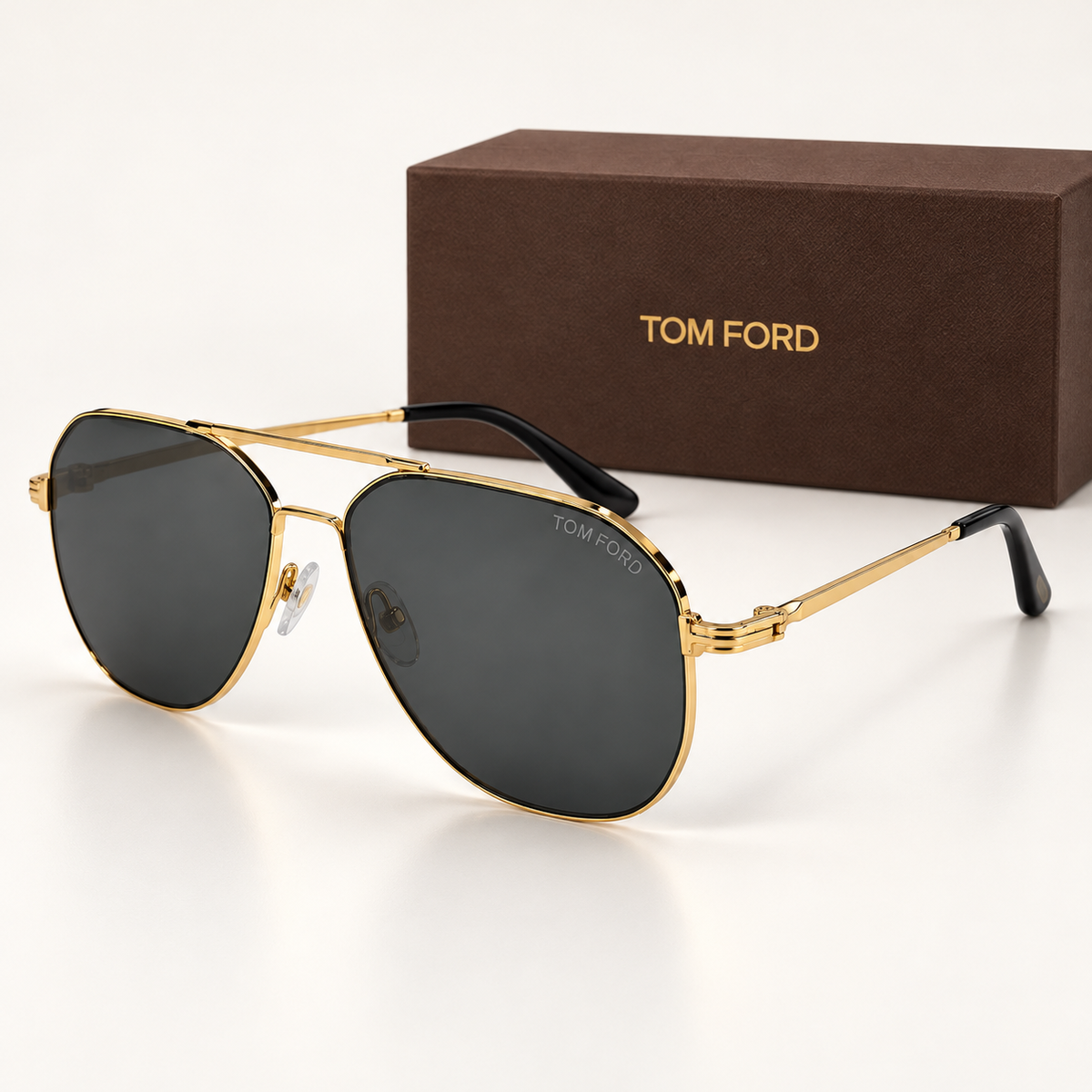 TF — Gold Geometric Aviator Sunglasses — front-left view with brand box