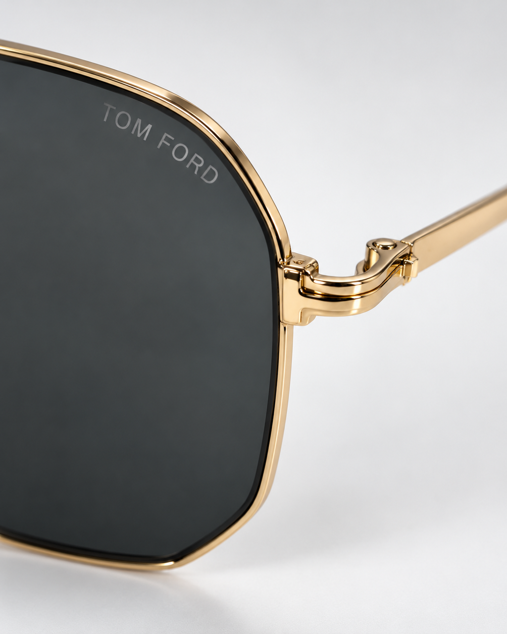 tom ford ft0852 28a gold navigator sunglasses — logo hinge detail