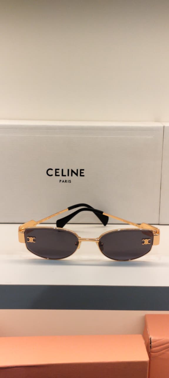 CLN — Gold Smoke Oval Sunglasses – Model 2 - actual product photograph 1